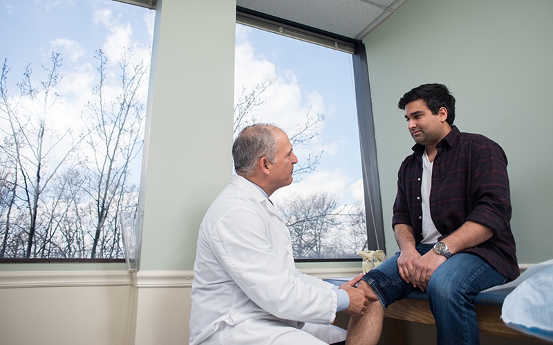 Doctor consulting patient