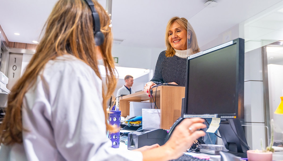 woman at front desk