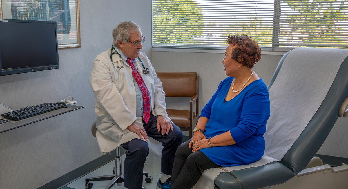 Doctor consulting patient