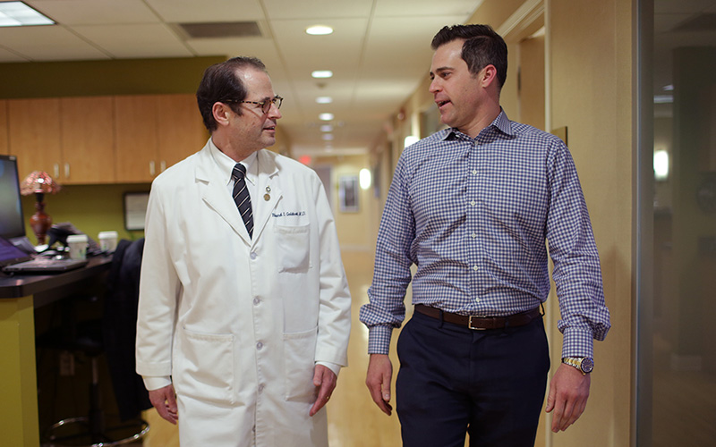 Doctor consulting patient